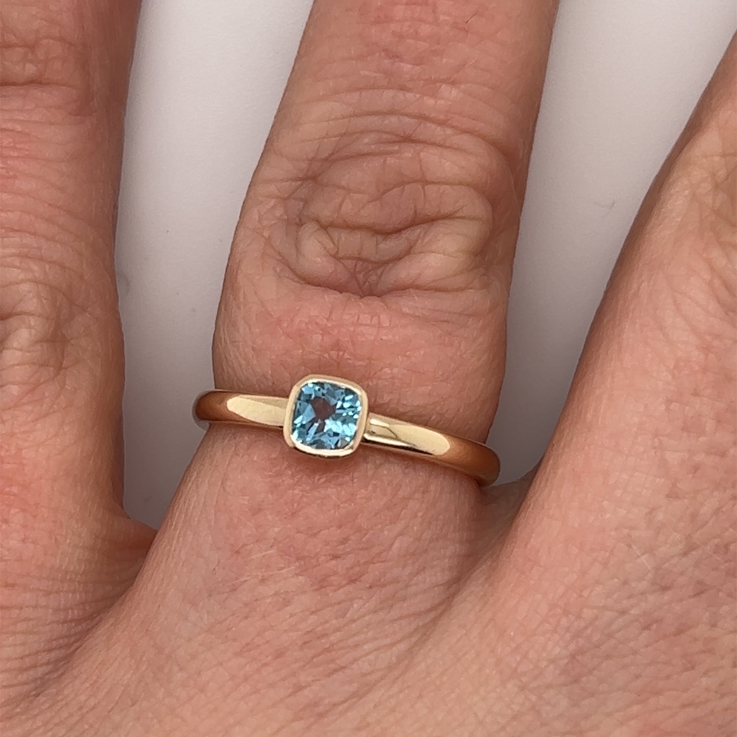 Swiss Blue Topaz & Yellow Gold cushion Cut Ring