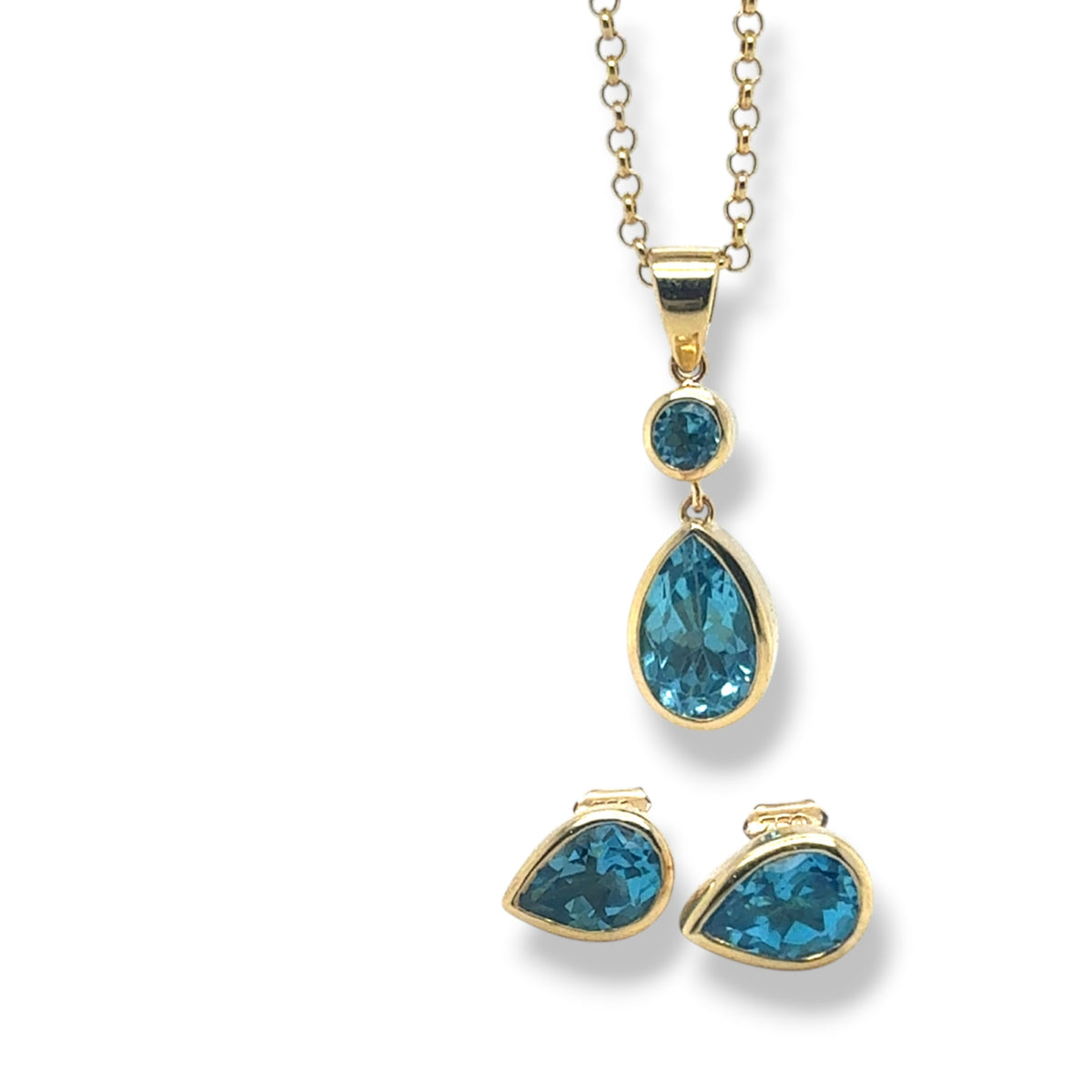 Gold-tone jewelry set featuring a teardrop blue topaz pendant necklace, and two matching teardrop stud earrings, all set with bright blue gemstones on a white background.